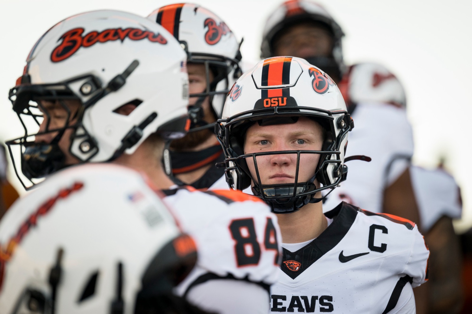 Braden Atkinson, a team captain, looking into the camera in his white road uniform and helmet before a game