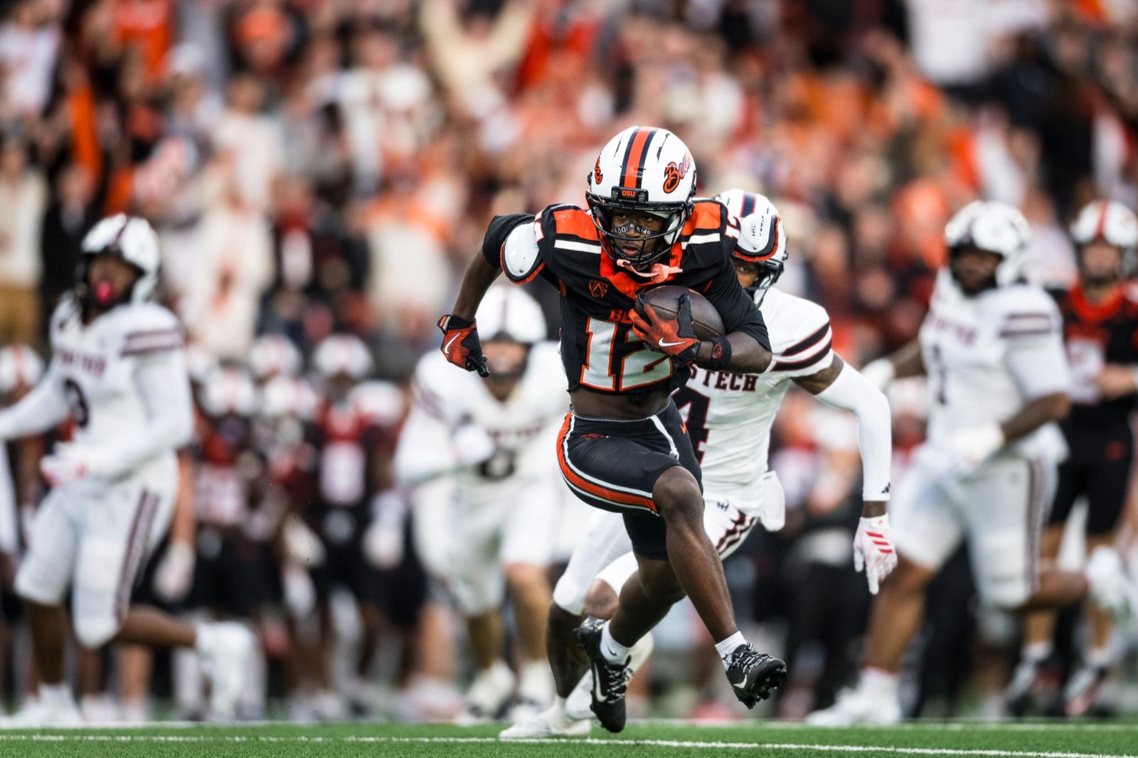 Jesse Legree running in the open field against Texas Tech